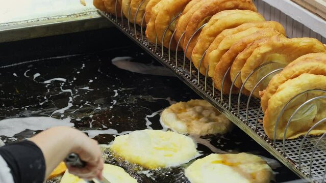 Traditional Hungarian street food Langos at fair
