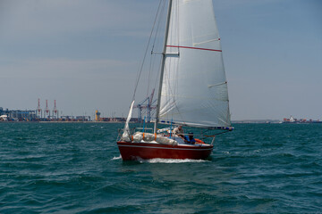 Sailing. Yacht ship with white sails in open sea. Luxury boats.. Yachting. Luxury Yachts.