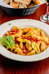 Italian Chicken. Chicken Cacciatore. Italian cuisine, alla cacciatora refers to a meal prepared 