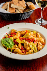 Italian Chicken. Chicken Cacciatore. Italian cuisine, alla cacciatora refers to a meal prepared 
