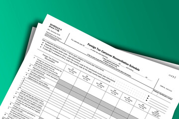 Obraz premium Form 1118 (Schedule K) documentation published IRS USA 43171. American tax document on colored