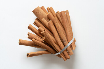 cinnamon sticks on a white background