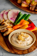 Hummus, Tzatziki served with pita bread and mezze. Greek and Mediterranean dips and spreads. Traditional classic Turkish and Greek cuisines. Hummus, Tzatziki served with pita bread and mezze. 