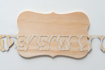 wood board with numbers (only partially visible)