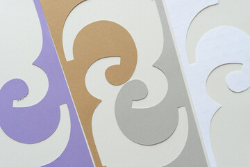 purple, brown, silver, and white elegant decor shapes on blank paper