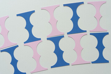 pink and blue paper balustrade shapes