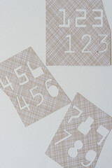 paper stencil with number cutouts