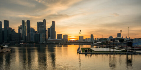 Landscape view of Singapore business district and city at twilight. Singapore cityscape at dusk building around Marina bay.