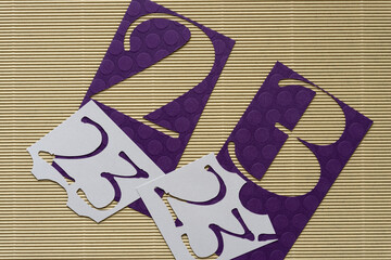 background with twenty-three on beige corrugated paper
