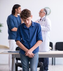 Young boy visiting doctor in hospital