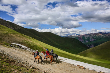 Fototapeta na wymiar Kyrgyz horserider, Jyrgalan Valley, Kyrgyzstan
