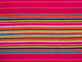 The colorful linear patterns of a cloth dishtowel
