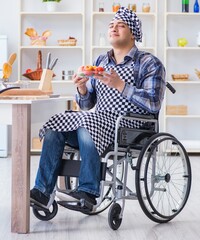 Young disabled husband preparing food salad