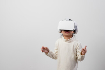 Asian little girl with virtual reality headset. Innovation technology and education concept