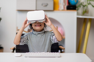 Asian little girl with virtual reality headset. Innovation technology and education concept
