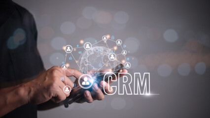 CRM Customer Relationship Management for business sales marketing system concept presented in futuristic graphic interface of service application to support CRM database analysis.