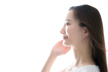 Fototapeta premium 髪の毛のヘアケアや未来に向けたイメージに使いやすい女性の写真