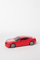 Fototapeta na wymiar Red Toy car isolated on white background. modern red toy car