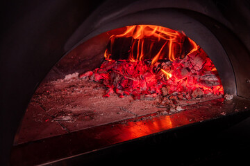 かまどの薪と炎　 red flame from a wood burning furnace