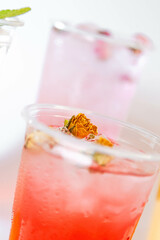 Set of different colors of lemonades and different flavors on a white background and against each other