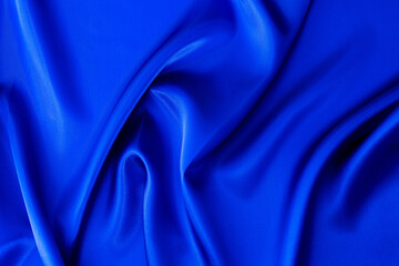 Close up of dark blue silk background