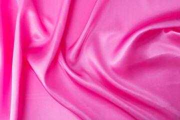 Obraz premium Close up of pink silk background