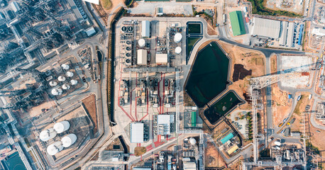Aerial top view of Tank oil refinery plant and petrochemical plant with tower column of...