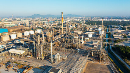 Aerial top view of Tank oil refinery plant and petrochemical plant with tower column of Petrochemistry industry in site construction and petrochemical plant