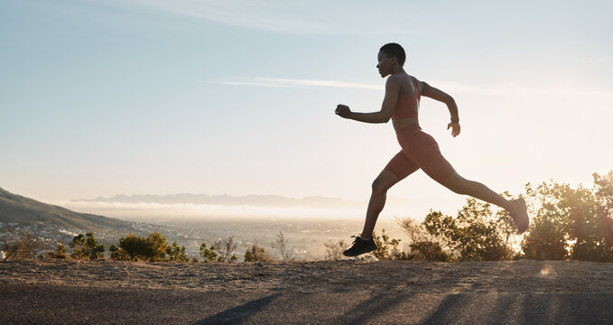 Black Woman, Fitness And Running On Mountain During Sunset For Workout, Training Or Exercise In The Nature Outdoors. African American Woman Runner In Sport Exercising For Healthy Cardio On Mockup