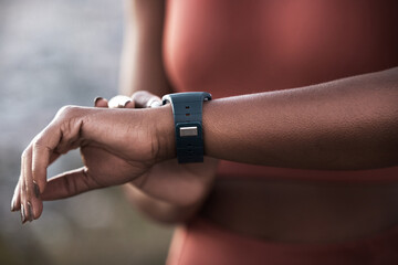 Hands, fitness and black woman checking time for performance, workout or schedule for exercise. Arm...