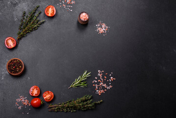 Fresh raw pork meat on the ribs with spices and herbs on a wooden cutting board