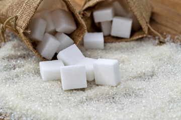 Sugar cubes on top of granulated sugar
