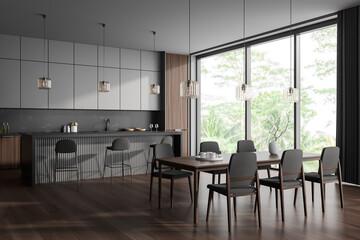 Corner view on dark kitchen room interior with dining table