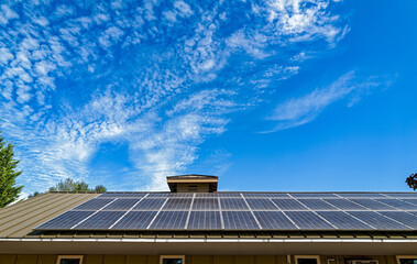 Solar panels installed on the top of a metal roof