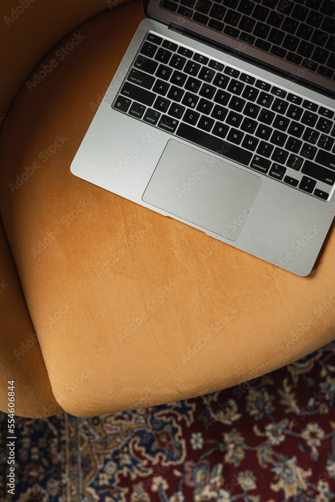 Wall mural flatlay of laptop computer keyboard. home office workspace. work at home. flat lay, top view