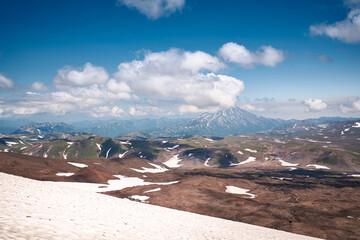 Hiking trail through alpine area. Beautiful landscape in the summer time. Kamchatka peninsula