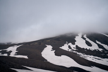 Hiking trail at the foot of Koryaksky volcano. Deserted landscape in the summer time. Kamchatka