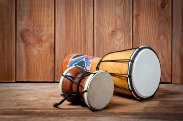 Damaru and djembe drums, percussion and musical instruments.
