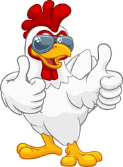 A chicken rooster cockerel bird cartoon character in cool shades or sunglasses giving a double thumbs up