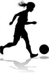 Fototapeta na wymiar A female soccer football player woman in silhouettes