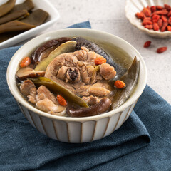 Delicious Taiwanese peeled green chili pepper chicken soup with mushroom and goji berry