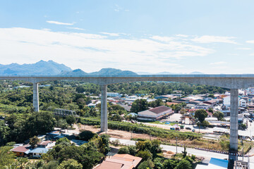 Obraz premium Aerial top view of Elevated railway at Muak Lek the highest in Thailand. Elevated approach bridges height 50 meters and rural landscape in autumn. Amphoe Muak Lek, Saraburi, Thailand.