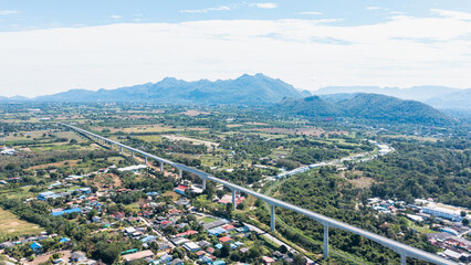 Aerial top view of Elevated railway at Muak Lek the highest in Thailand. Elevated approach bridges height 50 meters and rural landscape in autumn. Amphoe Muak Lek, Saraburi, Thailand.