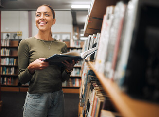 Student, happy and reading books in library for education learning or university research in...