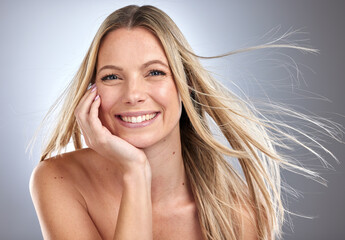 Woman, face or windy hair on studio background in keratin treatment marketing, healthcare wellness...