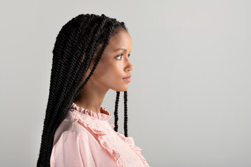 Young black woman with long braids