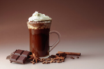 Coffee with whipped cream sprinkled with chocolate crumbs.