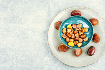 Roasted peeled chestnuts, flat lay