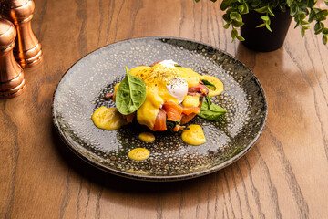 Salmon toast with poached egg and hollandaise sauce