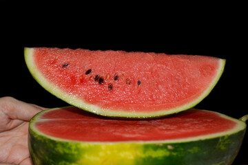 Watermelon red, natural, popular fruit, black background